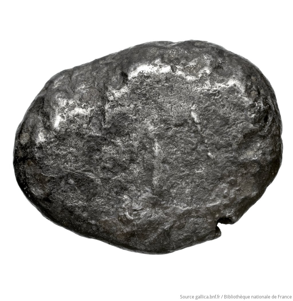 Reverse 'SilCoinCy A4425, Fonds général, acc.no.: Babelon 559. Silver coin of king Evelthon of Salamis 525 - 500 BC. Weight: 10.98g, Axis: -, Diameter: 21mm. Obverse type: ram lying l.. Obverse symbol: -. Obverse legend: e-u-we-le-to in Cypriot syllabic. Reverse type: smooth. Reverse symbol: -. Reverse legend: - in -. 'Catalogue des monnaies grecques de la Bibliothèque Nationale: les Perses Achéménides, les satrapes et les dynastes tributaires de leur empire: Cypre et la Phénicie'.