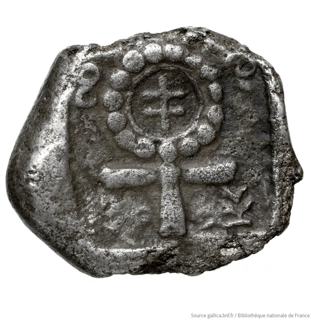 Reverse 'SilCoinCy A4440, Fonds général, acc.no.: Babelon 570. Silver coin of king Evelthon's successors of Salamis 500 - 478 BC. Weight: 8.98g, Axis: 5h, Diameter: 20mm. Obverse type: ram lying l.. Obverse symbol: -. Obverse legend: u-we in Cypriot syllabic. Reverse type: Ankh, the ring formed of pellets ranged about a linear circle; in circle, inscription: the whole in incuse square. In four corners, four cypriot-syllabic signs. Reverse symbol: -. Reverse legend: pa-si-le-wo in Cypriot syllabic. 'Catalogue des monnaies grecques de la Bibliothèque Nationale: les Perses Achéménides, les satrapes et les dynastes tributaires de leur empire: Cypre et la Phénicie'.