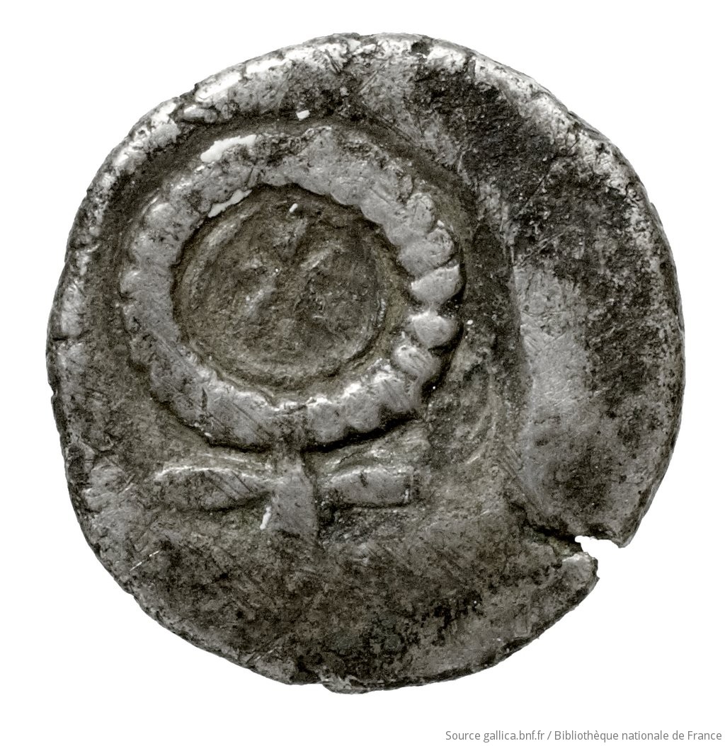 Οπισθότυπος 'SilCoinCy A4443, Fonds général, acc.no.: . Silver coin of king Evelthon's successors of Salamis 500 - 478 BC. Weight: 0.88g, Axis: 2h, Diameter: 10mm. Obverse type: ram's head right. Obverse symbol: -. Obverse legend: - in -. Reverse type: Ankh, the ring formed of pellets ranged about a linear circle; in circle, cypriot syllabic sign.. Reverse symbol: -. Reverse legend: ku in Cypriot syllabic.