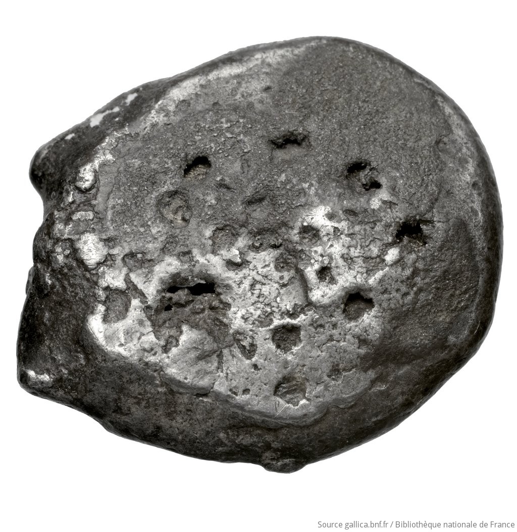 Οπισθότυπος 'SilCoinCy A4464, Fonds général, acc.no.: . Silver coin of king Evagoras I of Salamis 411 - 374 BC. Weight: 11.2g, Axis: -, Diameter: 22mm. Obverse type: ram lying l.. Obverse symbol: -. Obverse legend: - in -. Reverse type: smooth. Reverse symbol: -. Reverse legend: - in -.