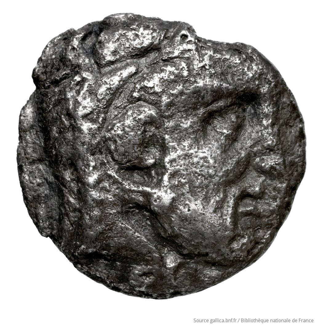 Εμπροσθότυπος 'SilCoinCy A4471, Fonds général, acc.no.: Babelon 591. Silver coin of king Evagoras I of Salamis 411 - 374 BC. Weight: 9.32g, Axis: 9h, Diameter: 20mm. Obverse type: Head of Herakles right, bearded, wearing lion's skin with forelegs knotted round his neck: linear border.. Obverse symbol: -. Obverse legend: - in Cypriot syllabic. Reverse type: Goat lying right, on dotted exergual line: the whole in deep incuse square.. Reverse symbol: grain d’orge. Reverse legend: le in Cypriot syllabic. 'Catalogue des monnaies grecques de la Bibliothèque Nationale: les Perses Achéménides, les satrapes et les dynastes tributaires de leur empire: Cypre et la Phénicie'.