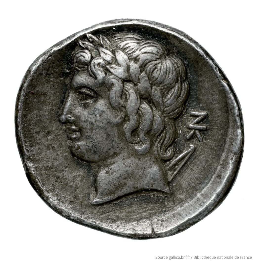 Reverse 'SilCoinCy A4511, Fonds général, acc.no.: Babelon 635. Silver coin of king Nikokreon of Salamis 331 - 310/9 BC. Weight: 6.22g, Axis: 12h, Diameter: 21mm. Obverse type: Bust of Aphrodite right, wearing a turreted crown. Obverse symbol: -. Obverse legend: ΒΑ in Greek. Reverse type: Head of Apollo with short hair left, wearing a laurel wreath; bow behind his back. Reverse symbol: -. Reverse legend: ΝΚ in Greek. 'Catalogue des monnaies grecques de la Bibliothèque Nationale: les Perses Achéménides, les satrapes et les dynastes tributaires de leur empire: Cypre et la Phénicie'.