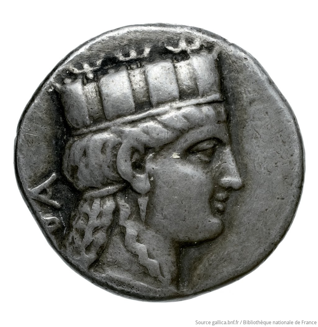 Obverse 'SilCoinCy A4512, Fonds général, acc.no.: Babelon 636. Silver coin of king Nikokreon of Salamis 331 - 310/9 BC. Weight: 6.34g, Axis: 11h, Diameter: 18mm. Obverse type: Bust of Aphrodite right, wearing a turreted crown. Obverse symbol: -. Obverse legend: ΒΑ in Greek. Reverse type: Head of Apollo with short hair left, wearing a laurel wreath; bow behind his back. Reverse symbol: -. Reverse legend: ΝΚ in Greek. 'Catalogue des monnaies grecques de la Bibliothèque Nationale: les Perses Achéménides, les satrapes et les dynastes tributaires de leur empire: Cypre et la Phénicie'.