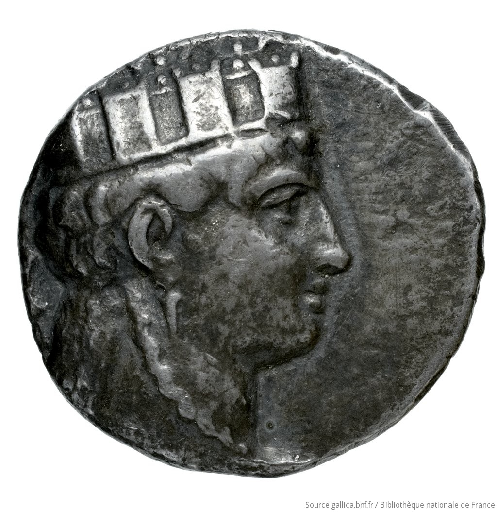 Obverse 'SilCoinCy A4513, Fonds général, acc.no.: Babelon 637. Silver coin of king Nikokreon of Salamis 331 - 310/9 BC. Weight: 6.1g, Axis: 12h, Diameter: 19mm. Obverse type: Bust of Aphrodite right, wearing a turreted crown. Obverse symbol: -. Obverse legend: ΒΑ in Greek. Reverse type: Head of Apollo with short hair left, wearing a laurel wreath; bow behind his back. Reverse symbol: -. Reverse legend: ΝΚ in Greek. 'Catalogue des monnaies grecques de la Bibliothèque Nationale: les Perses Achéménides, les satrapes et les dynastes tributaires de leur empire: Cypre et la Phénicie'.