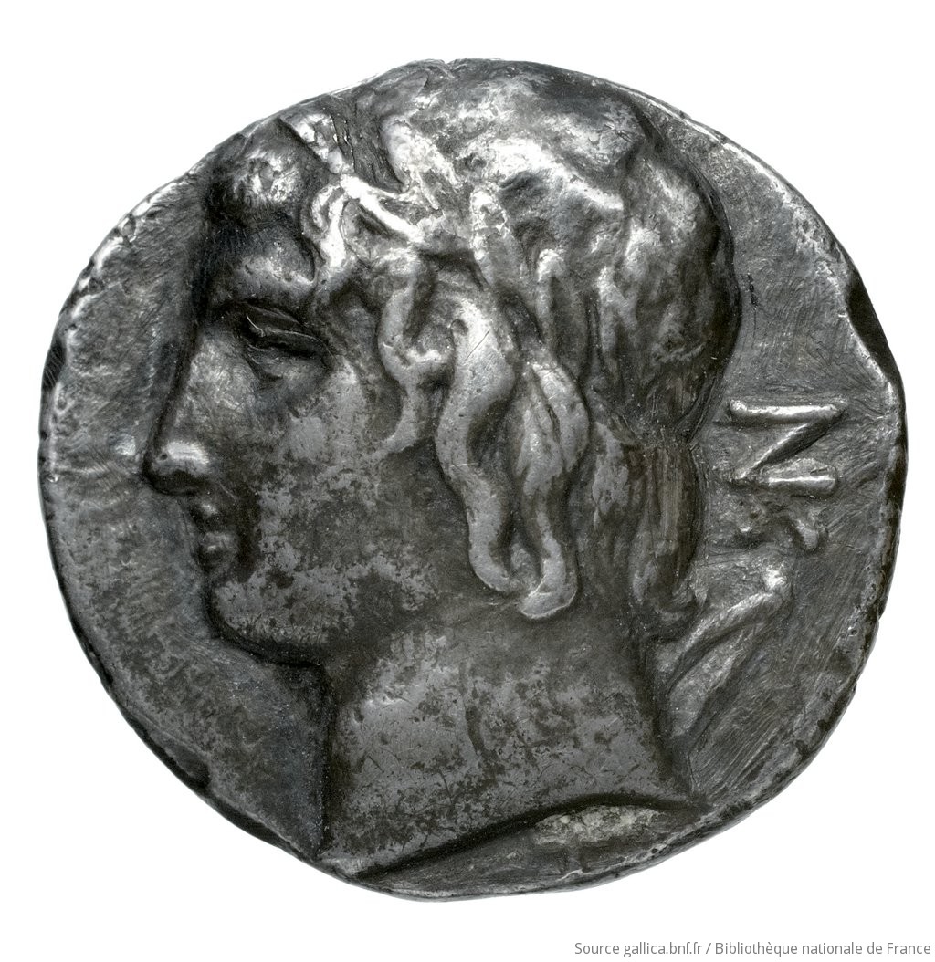 Reverse 'SilCoinCy A4513, Fonds général, acc.no.: Babelon 637. Silver coin of king Nikokreon of Salamis 331 - 310/9 BC. Weight: 6.1g, Axis: 12h, Diameter: 19mm. Obverse type: Bust of Aphrodite right, wearing a turreted crown. Obverse symbol: -. Obverse legend: ΒΑ in Greek. Reverse type: Head of Apollo with short hair left, wearing a laurel wreath; bow behind his back. Reverse symbol: -. Reverse legend: ΝΚ in Greek. 'Catalogue des monnaies grecques de la Bibliothèque Nationale: les Perses Achéménides, les satrapes et les dynastes tributaires de leur empire: Cypre et la Phénicie'.