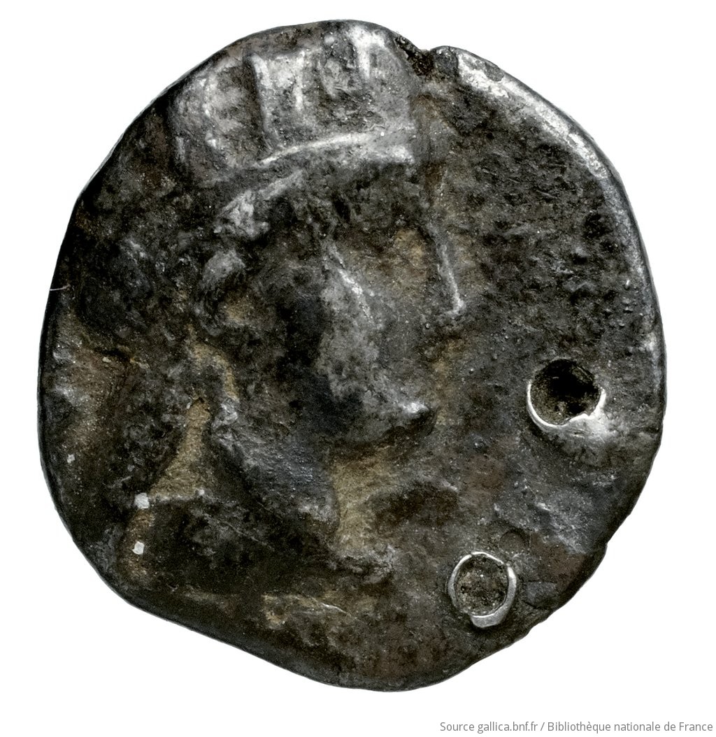 Obverse 'SilCoinCy A4516, Waddington, acc.no.: Babelon 639A. Silver coin of king Nikokreon of Salamis 331 - 310/9 BC. Weight: 2.09g, Axis: 12h, Diameter: 13mm. Obverse type: Bust of Aphrodite right, wearing a turreted crown. Obverse symbol: -. Obverse legend: - in -. Reverse type: Head of Apollo with short hair left, wearing a laurel wreath; bow behind his back. Reverse symbol: -. Reverse legend: - in -. 'Catalogue des monnaies grecques de la Bibliothèque Nationale: les Perses Achéménides, les satrapes et les dynastes tributaires de leur empire: Cypre et la Phénicie'.