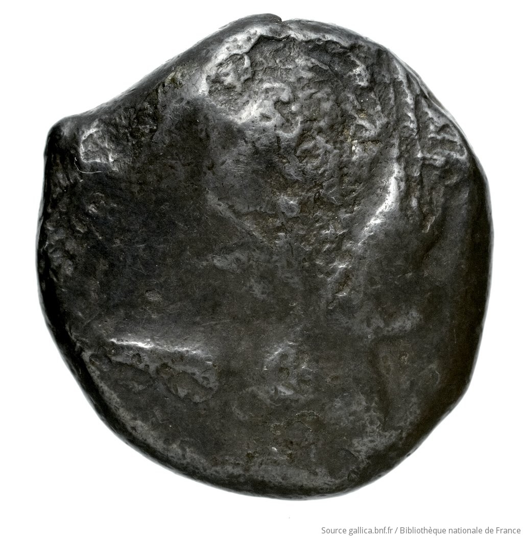 Obverse 'SilCoinCy A4533, Fonds général, acc.no.: Babelon 672. Silver coin of king Ozibaal of Kition 450 - 425 BC. Weight: 10.92g, Axis: 9h, Diameter: 20mm. Obverse type: Herakles, wearing lion's skin over head and hanging down his back, advancing to right; in outstretched left bow, in right his club raised over his head: border of dots.. Obverse symbol: -. Obverse legend: - in -. Reverse type: Lion right, bringing down stag right; dotted square within incuse square. Reverse symbol: -. Reverse legend: l'zb'l in Phoenician. 'Catalogue des monnaies grecques de la Bibliothèque Nationale: les Perses Achéménides, les satrapes et les dynastes tributaires de leur empire: Cypre et la Phénicie'.