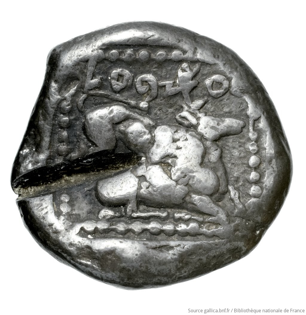 Reverse 'SilCoinCy A4533, Fonds général, acc.no.: Babelon 672. Silver coin of king Ozibaal of Kition 450 - 425 BC. Weight: 10.92g, Axis: 9h, Diameter: 20mm. Obverse type: Herakles, wearing lion's skin over head and hanging down his back, advancing to right; in outstretched left bow, in right his club raised over his head: border of dots.. Obverse symbol: -. Obverse legend: - in -. Reverse type: Lion right, bringing down stag right; dotted square within incuse square. Reverse symbol: -. Reverse legend: l'zb'l in Phoenician. 'Catalogue des monnaies grecques de la Bibliothèque Nationale: les Perses Achéménides, les satrapes et les dynastes tributaires de leur empire: Cypre et la Phénicie'.