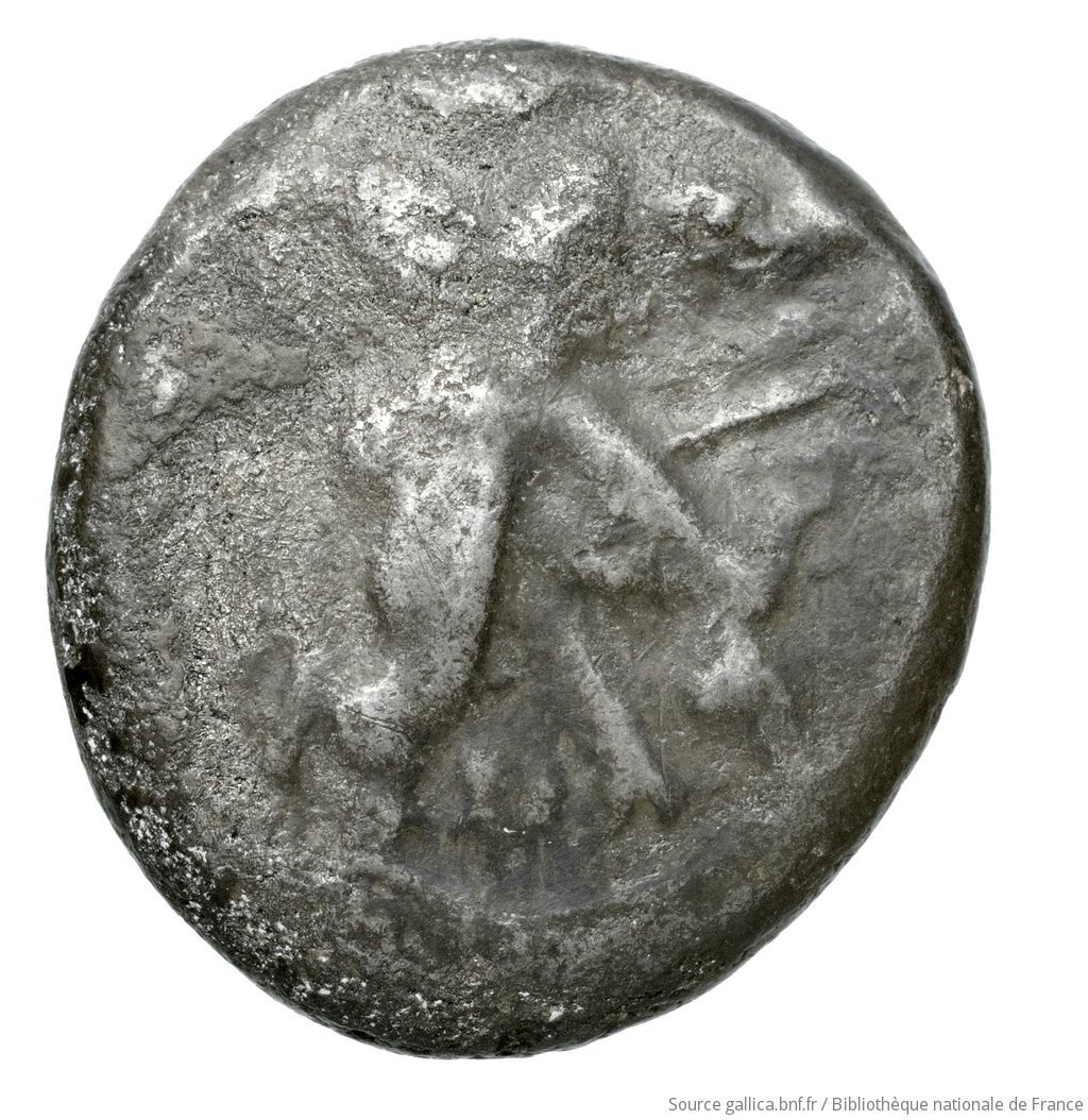 Obverse 'SilCoinCy A4534, Waddington, acc.no.: Babelon 677A. Silver coin of king Ozibaal of Kition 450 - 425 BC. Weight: 10.7g, Axis: 4h, Diameter: 19mm. Obverse type: Herakles, wearing lion's skin over head and hanging down his back, advancing to right; in outstretched left bow, in right his club raised over his head: border of dots.. Obverse symbol: -. Obverse legend: - in -. Reverse type: Lion right, bringing down stag right; dotted square within incuse square. Reverse symbol: -. Reverse legend: l'zb'l in Phoenician. 'Catalogue des monnaies grecques de la Bibliothèque Nationale: les Perses Achéménides, les satrapes et les dynastes tributaires de leur empire: Cypre et la Phénicie'.