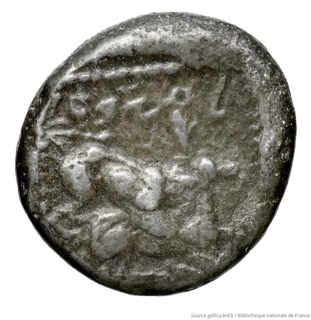 Reverse 'SilCoinCy A4534, Waddington, acc.no.: Babelon 677A. Silver coin of king Ozibaal of Kition 450 - 425 BC. Weight: 10.7g, Axis: 4h, Diameter: 19mm. Obverse type: Herakles, wearing lion's skin over head and hanging down his back, advancing to right; in outstretched left bow, in right his club raised over his head: border of dots.. Obverse symbol: -. Obverse legend: - in -. Reverse type: Lion right, bringing down stag right; dotted square within incuse square. Reverse symbol: -. Reverse legend: l'zb'l in Phoenician. 'Catalogue des monnaies grecques de la Bibliothèque Nationale: les Perses Achéménides, les satrapes et les dynastes tributaires de leur empire: Cypre et la Phénicie'.