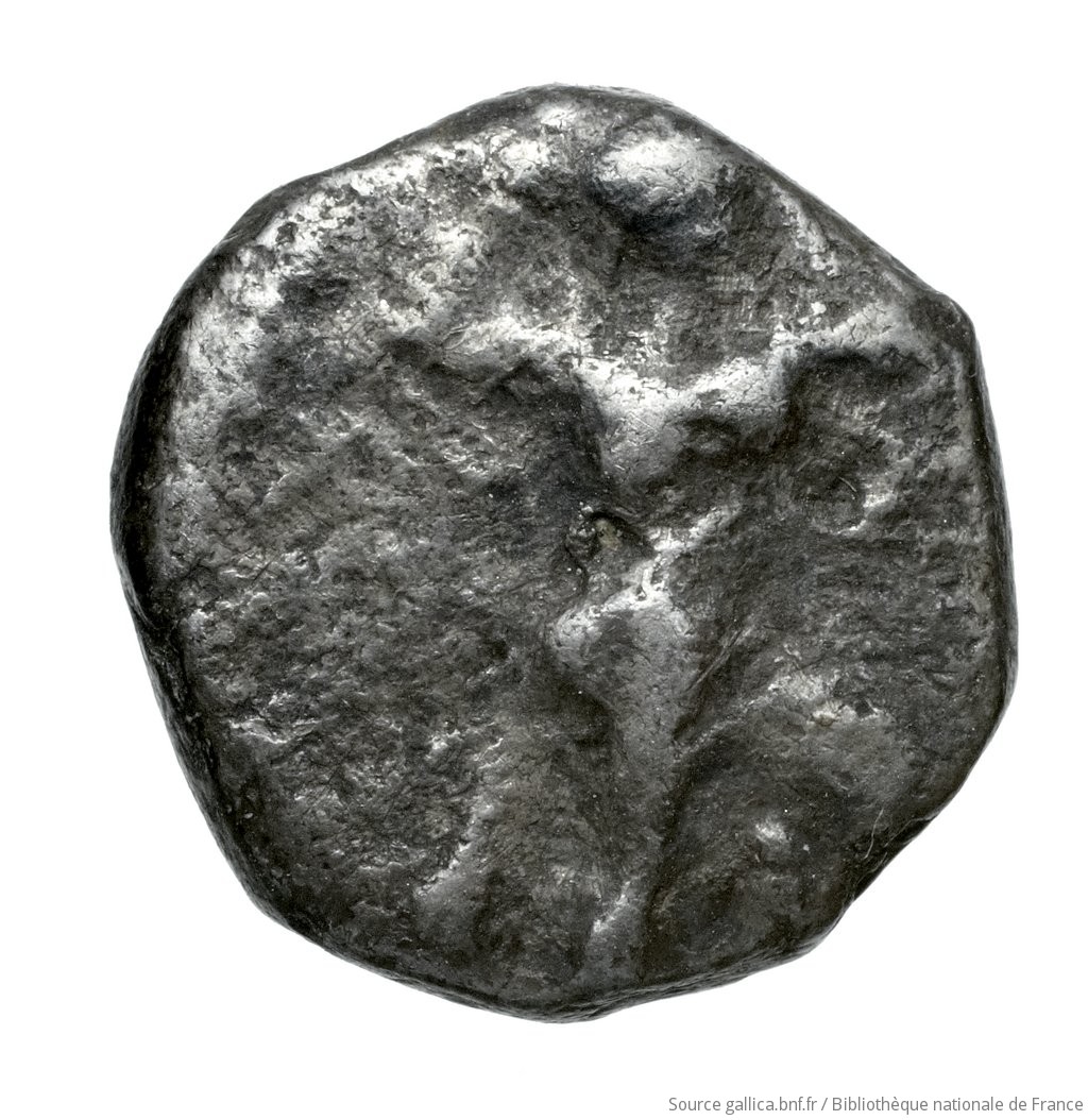 Obverse 'SilCoinCy A4538, Fonds général, acc.no.: Babelon 677. Silver coin of king Ozibaal of Kition 450 - 425 BC. Weight: 3.67g, Axis: 7h, Diameter: 14mm. Obverse type: Herakles, wearing lion's skin over head and hanging down his back, advancing to right; in outstretched left bow, in right his club raised over his head: border of dots.. Obverse symbol: -. Obverse legend: - in -. Reverse type: Lion right, bringing down stag right; dotted square within incuse square. Reverse symbol: -. Reverse legend: ' in Phoenician. 'Catalogue des monnaies grecques de la Bibliothèque Nationale: les Perses Achéménides, les satrapes et les dynastes tributaires de leur empire: Cypre et la Phénicie'.