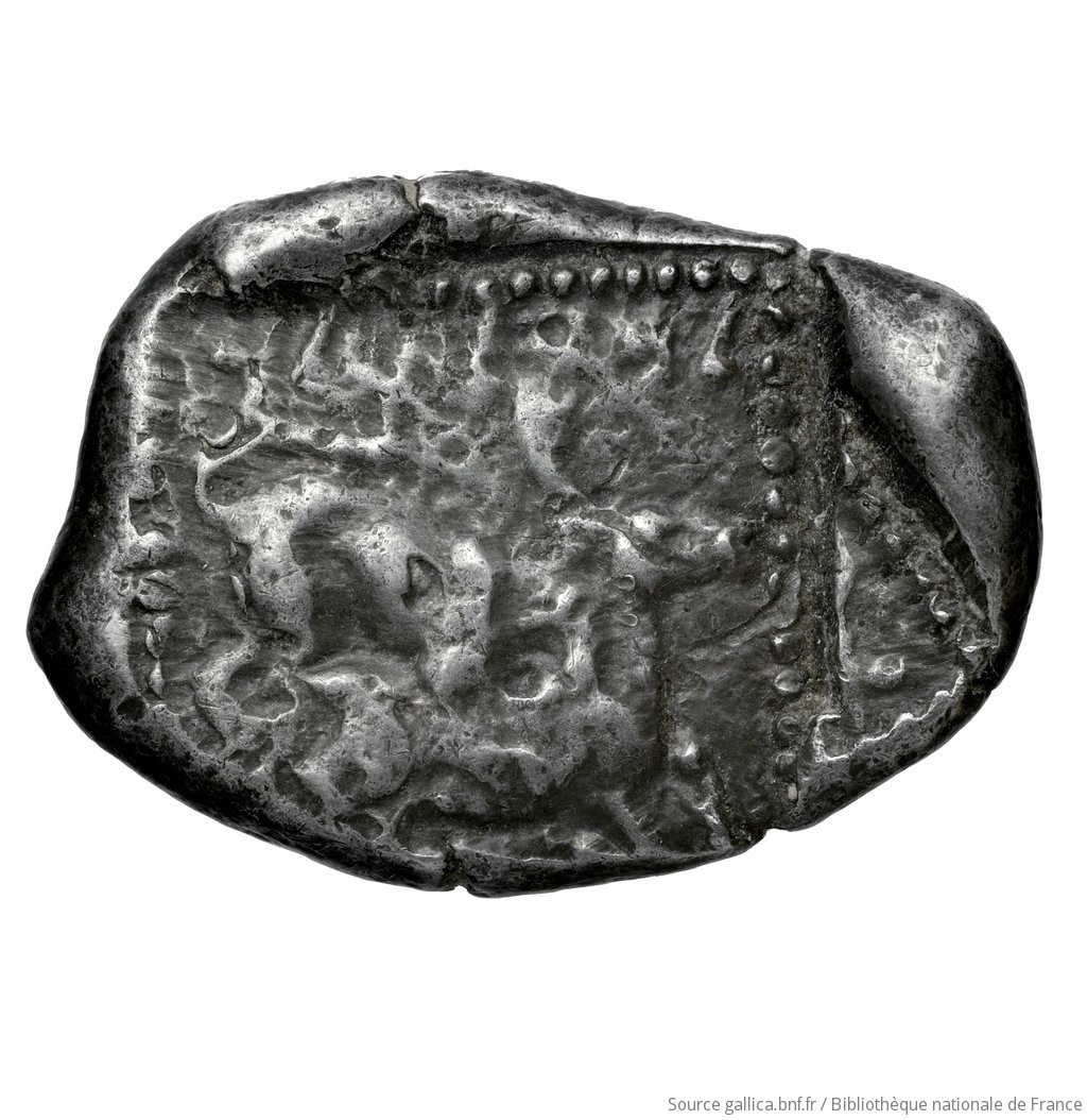 Reverse 'SilCoinCy A4539, Fonds général, acc.no.: Babelon 678. Silver coin of king Baalmilk II of Kition 425 - 400 BC. Weight: 10.93g, Axis: 9h, Diameter: 26mm. Obverse type: Herakles, wearing lion's skin over head and hanging down his back, advancing to right; in outstretched left bow, in right his club raised over his head: border of dots.. Obverse symbol: -. Obverse legend: - in -. Reverse type: Lion right, bringing down stag right; dotted square within incuse square. Reverse symbol: -. Reverse legend: lb'lmlk in Phoenician. 'Catalogue des monnaies grecques de la Bibliothèque Nationale: les Perses Achéménides, les satrapes et les dynastes tributaires de leur empire: Cypre et la Phénicie'.