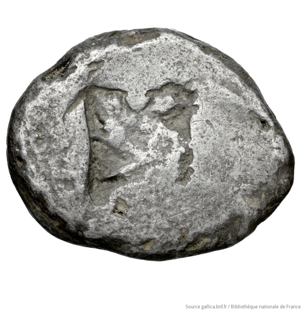 Οπισθότυπος 'SilCoinCy A4563, Fonds général, acc.no.: . Silver coin of king Gras or Gra(-) of Idalion 470+ BC - . Weight: 10.69g, Axis: -, Diameter: 25mm. Obverse type: Sphinx, with plume on head, curled wing, seated right, left forefoot raised, over two palmettes.. Obverse symbol: -. Obverse legend: pa / ka-ra in Cypriot syllabic. Reverse type: Irregular incuse. Reverse symbol: -. Reverse legend: - in -.